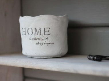 white Home printer vase on white wooden board